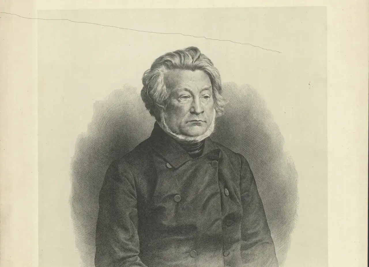 Portret mężczyzny z burzą siwych włosów i kilkudniowym zarostem, ubranego w dwurzędowy płaszcz. Jego wyraz twarzy sugeruje głębokie zamyślenie, typowe dla epoki romantyzmu.
